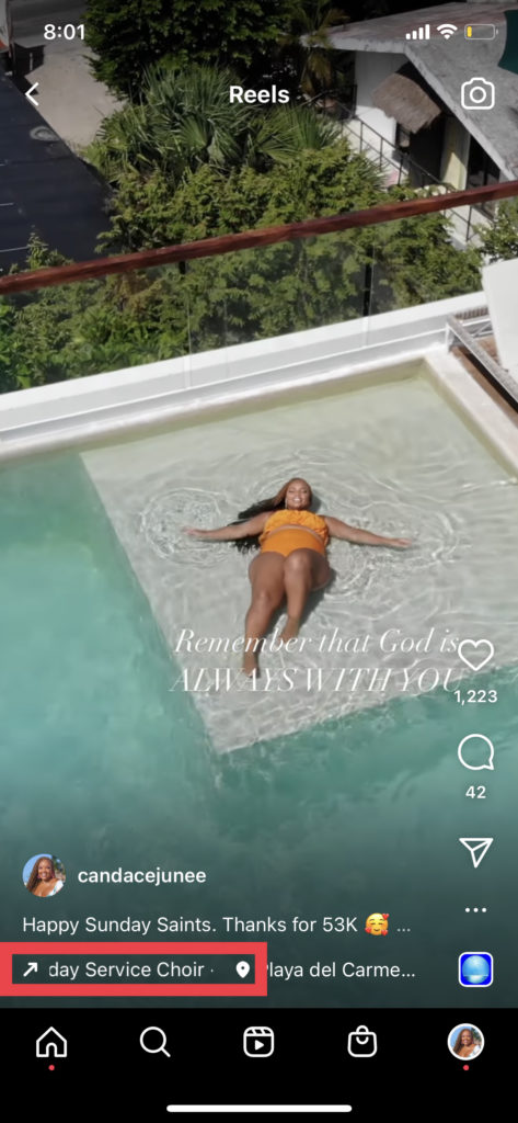 A screenshot of an instagram reel with a black woman in an orange swimsuit on a rooftop in a pool. The woman has blonde locs. Her name is Candace Junée.