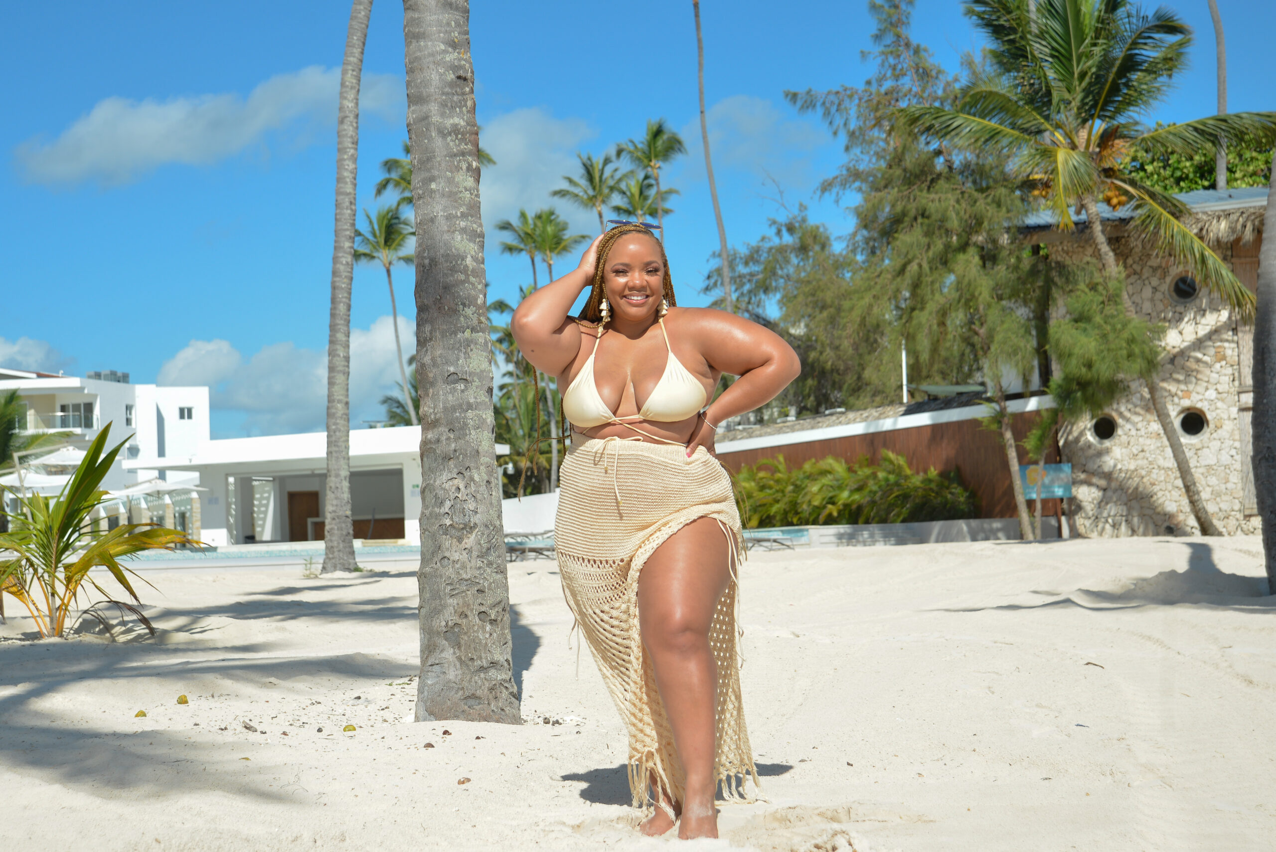 black woman standing on the beach in punta cana dominican republic